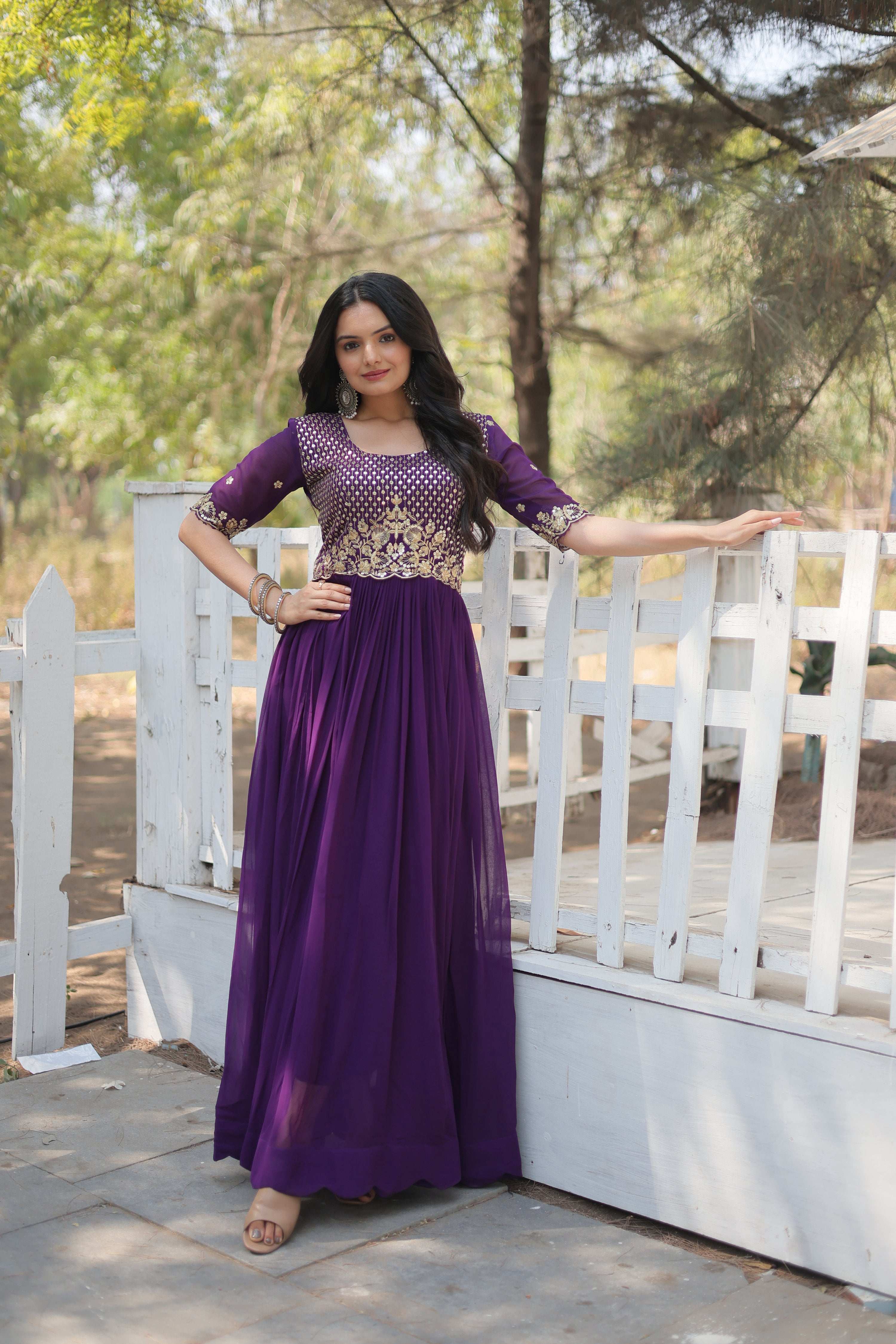 Elegant purple Faux Blooming Anarkali dress with gold Zari embroidery and sequins.