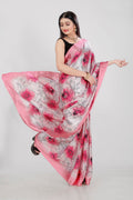 A vibrant multicolor Japan Satin saree with modern digital prints and matching blouse