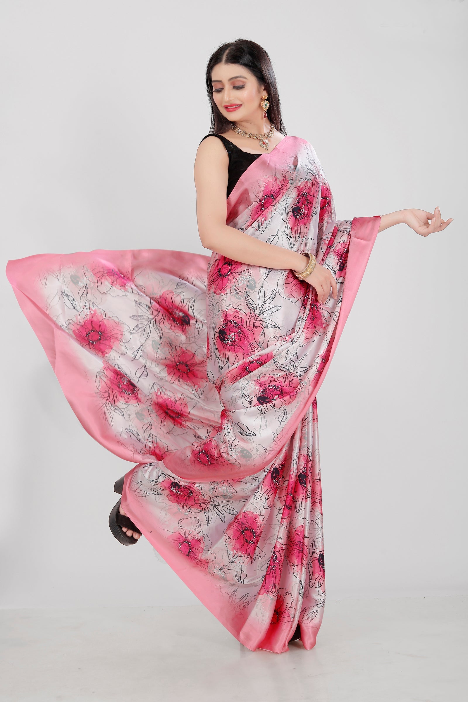 A vibrant multicolor Japan Satin saree with modern digital prints and matching blouse