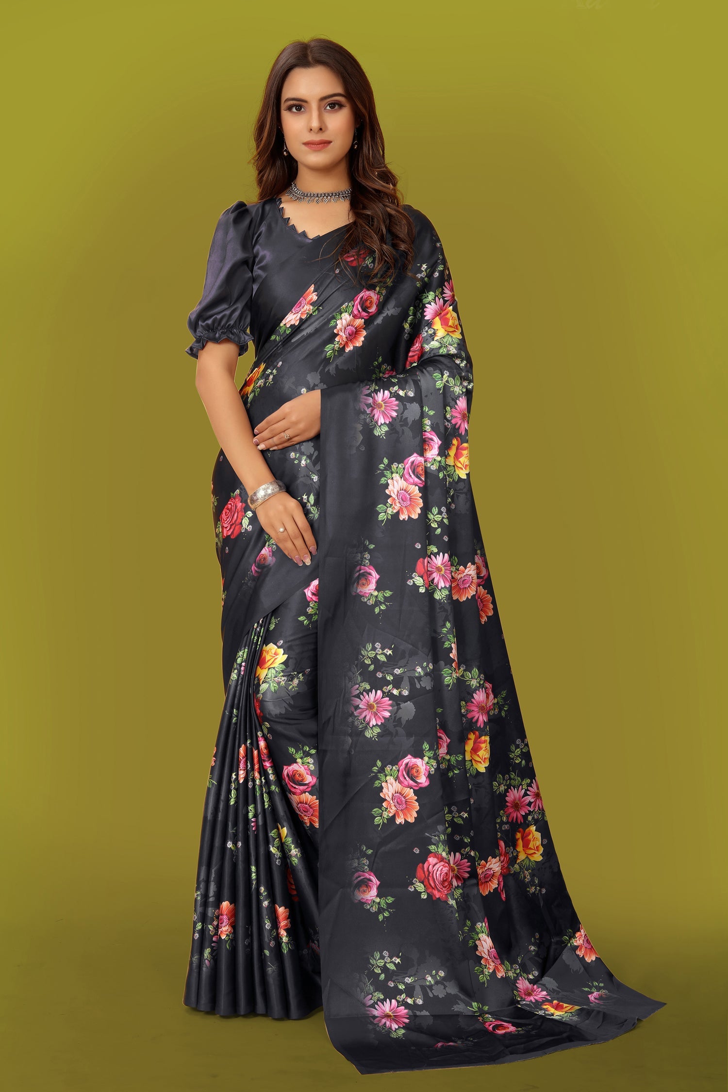 Woman wearing a vibrant multicolor Pure Japan Satin digital printed designer saree with matching blouse