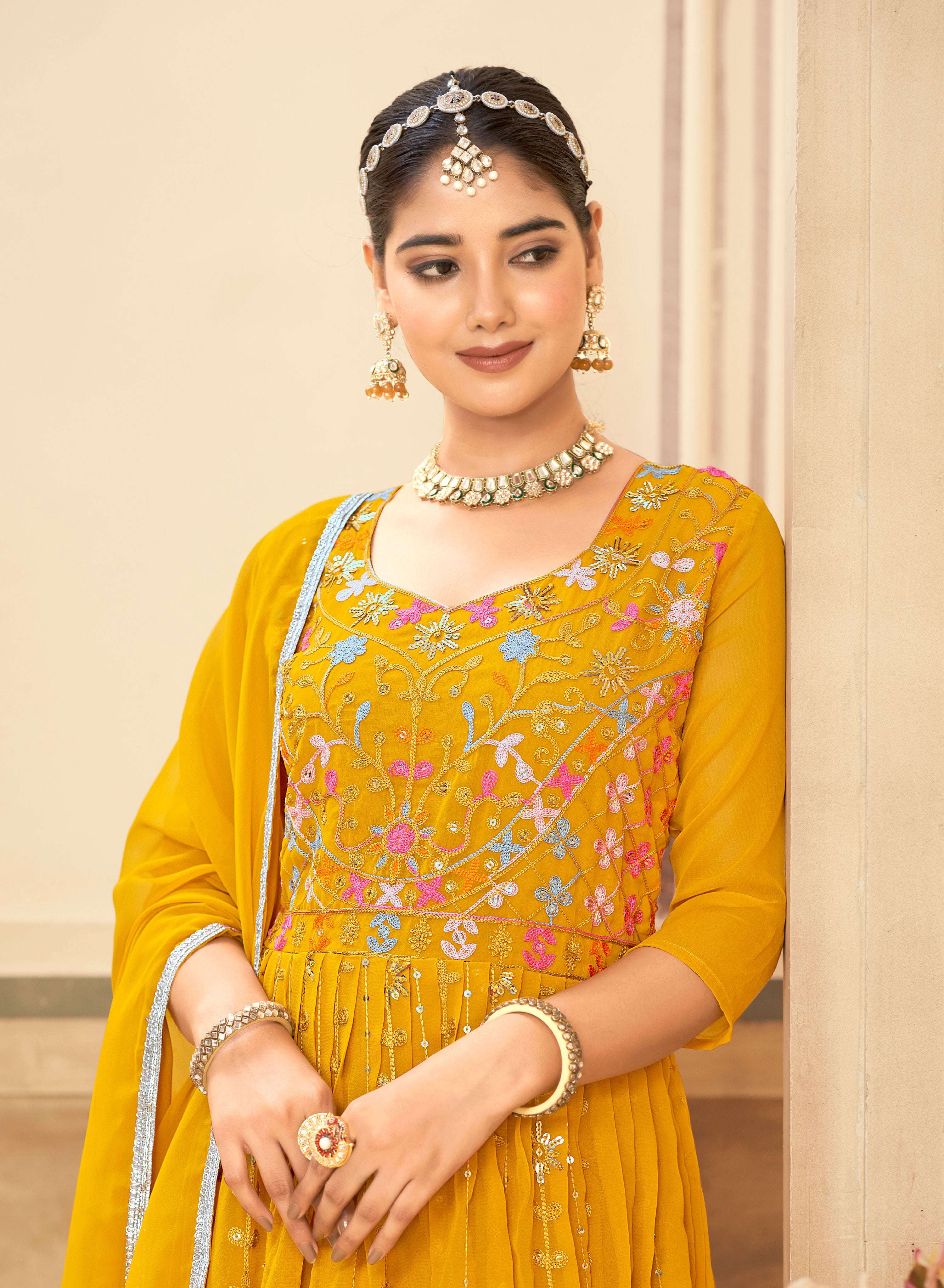 Women's Mustard Faux Georgette Heavy Embroidered Floor Length Kurta