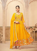 Mustard floor-length faux georgette kurta with heavy embroidery detail.