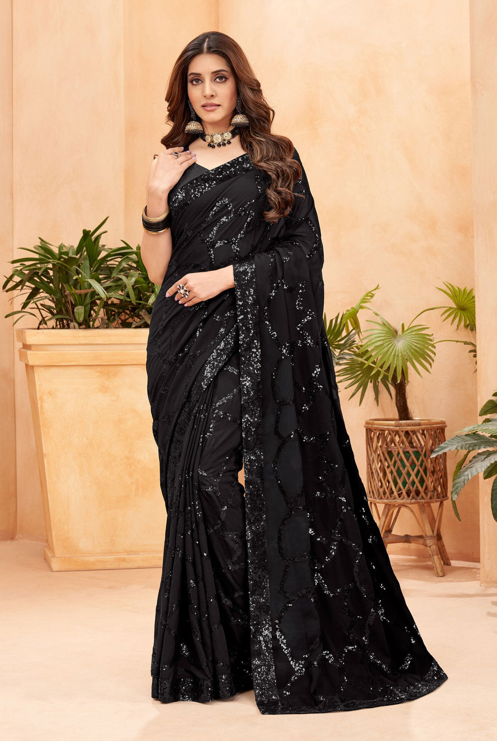 Black Faux Blooming Georgette Saree with sequins work and matching blouse