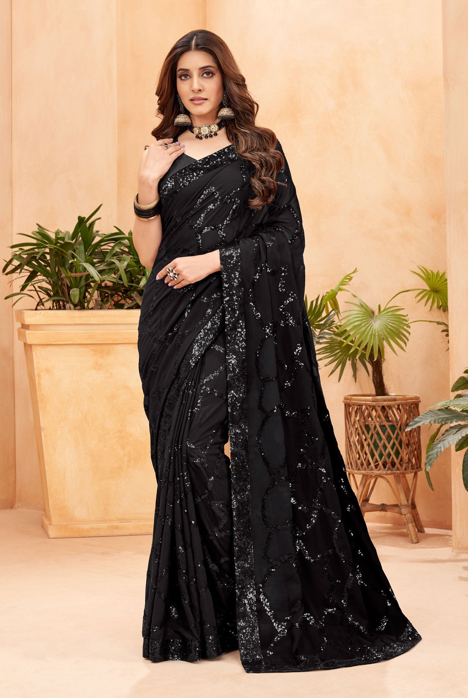 Black Faux Blooming Georgette Saree with sequins work and matching blouse