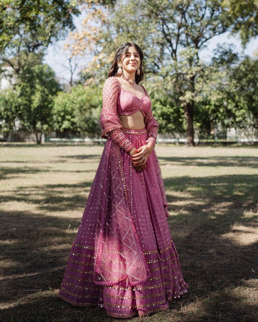Metallic pink faux georgette lehenga with sequin and zari embroidery