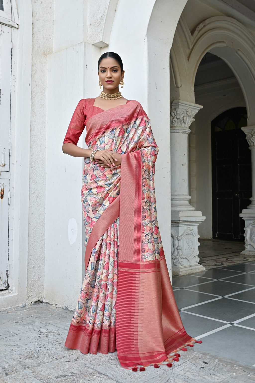 Peach Tussar Silk Saree with rich Zari woven border and blouse piece.