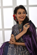 Green soft tussar silk saree with printed temple border and matching blouse