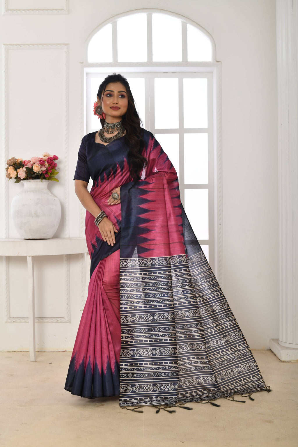 Pink Soft Tussar Silk Saree featuring a traditional printed temple border and matching blouse.