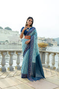 Firozi soft silk traditional saree with golden zari woven patterns