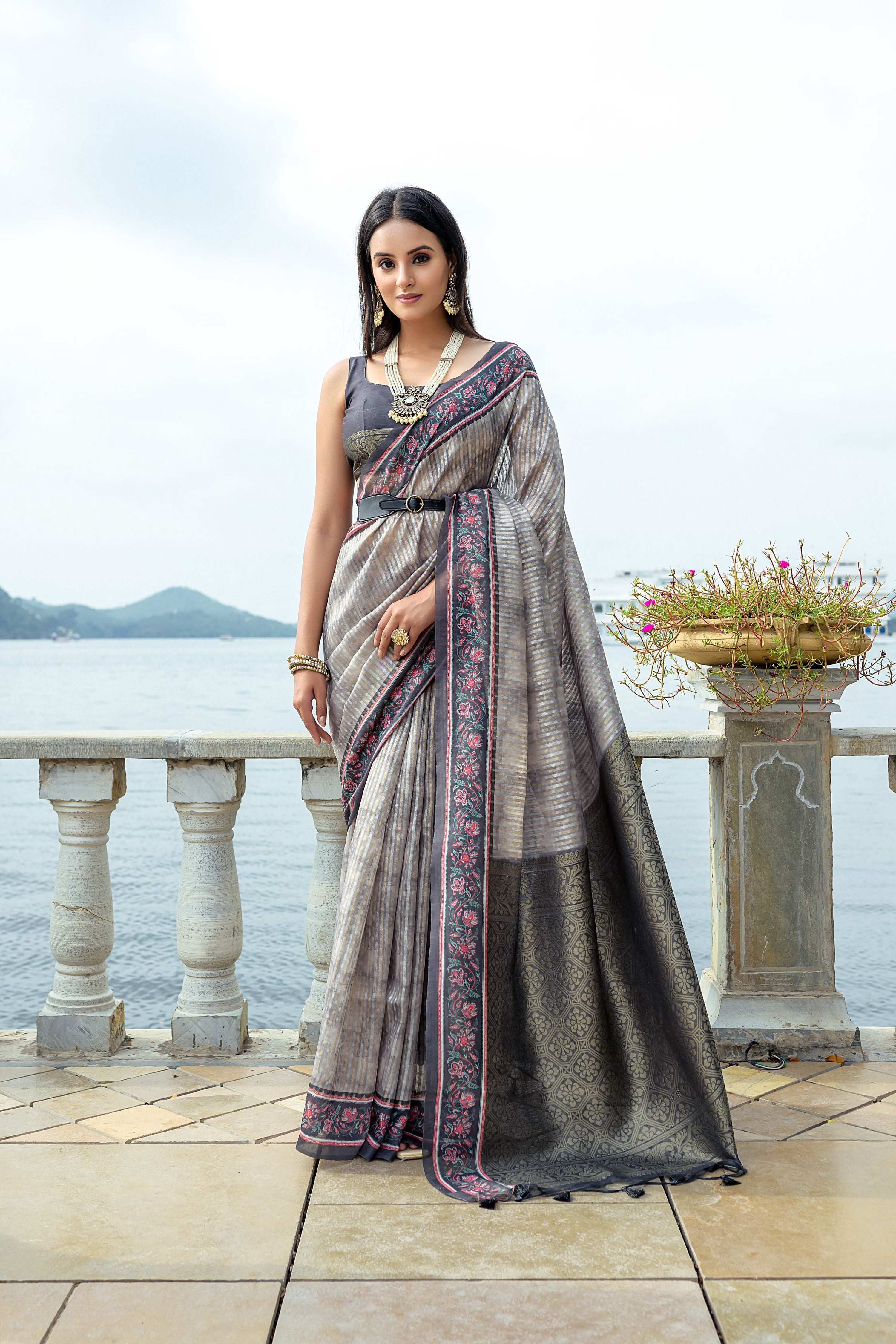 Grey soft silk traditional saree with intricate Zari woven border and blouse piece