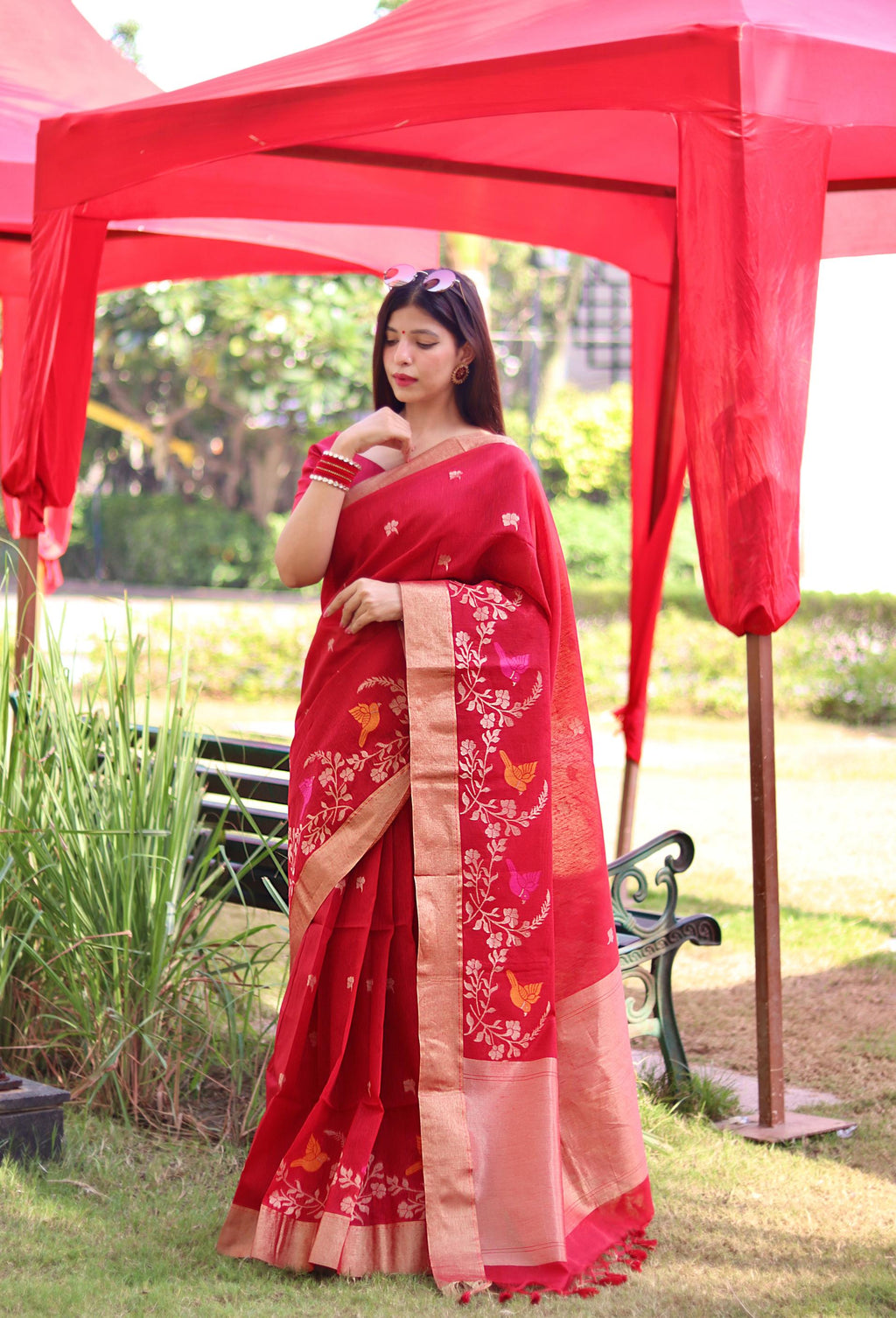 Red Linen Silk Saree with elegant Zari Woven detailing and unstitched blouse