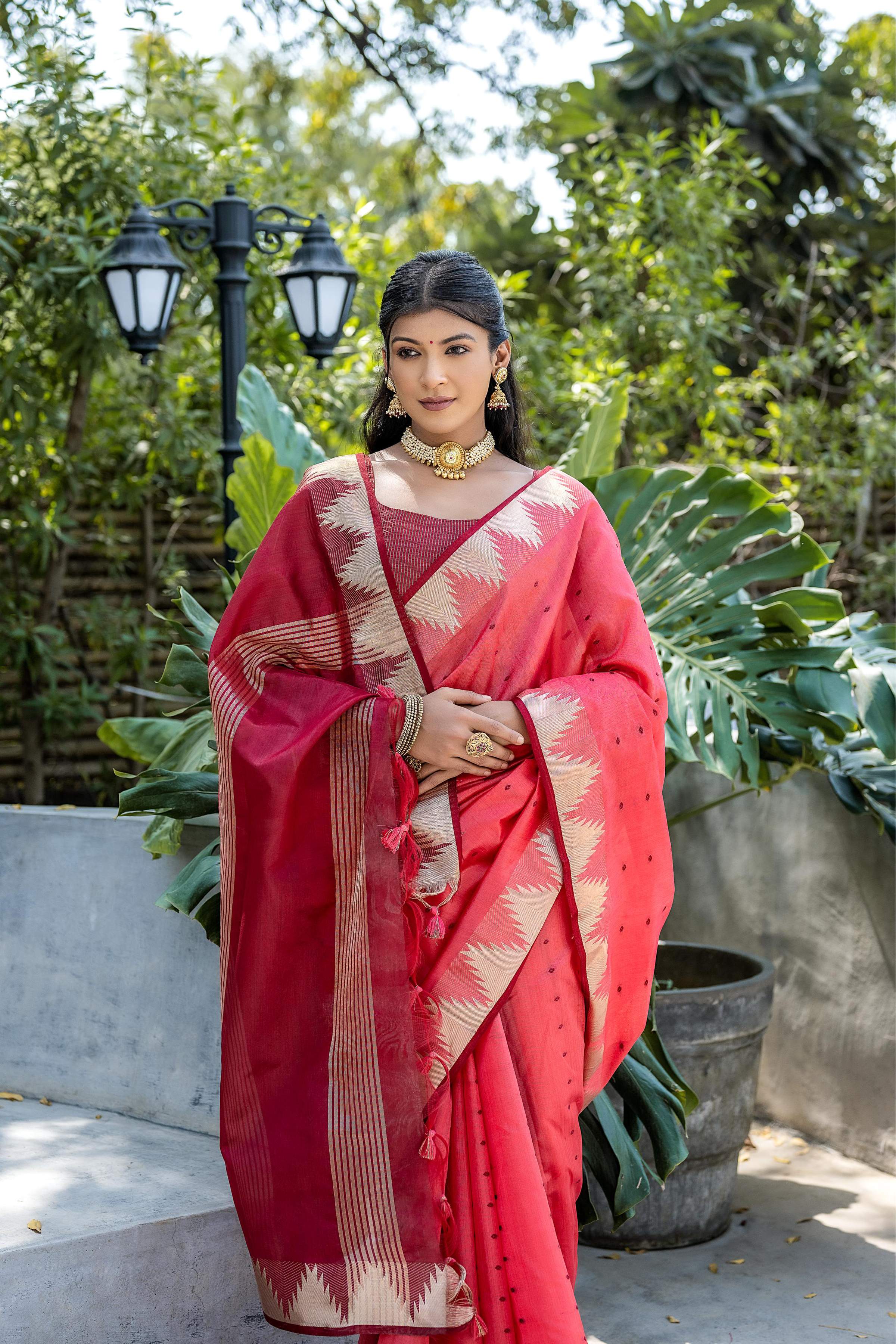Coral Tussar Silk Saree with Traditional Temple Border & Zari