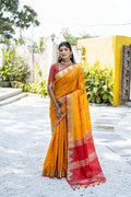 Mustard tussar silk saree with traditional temple border and zari detailing