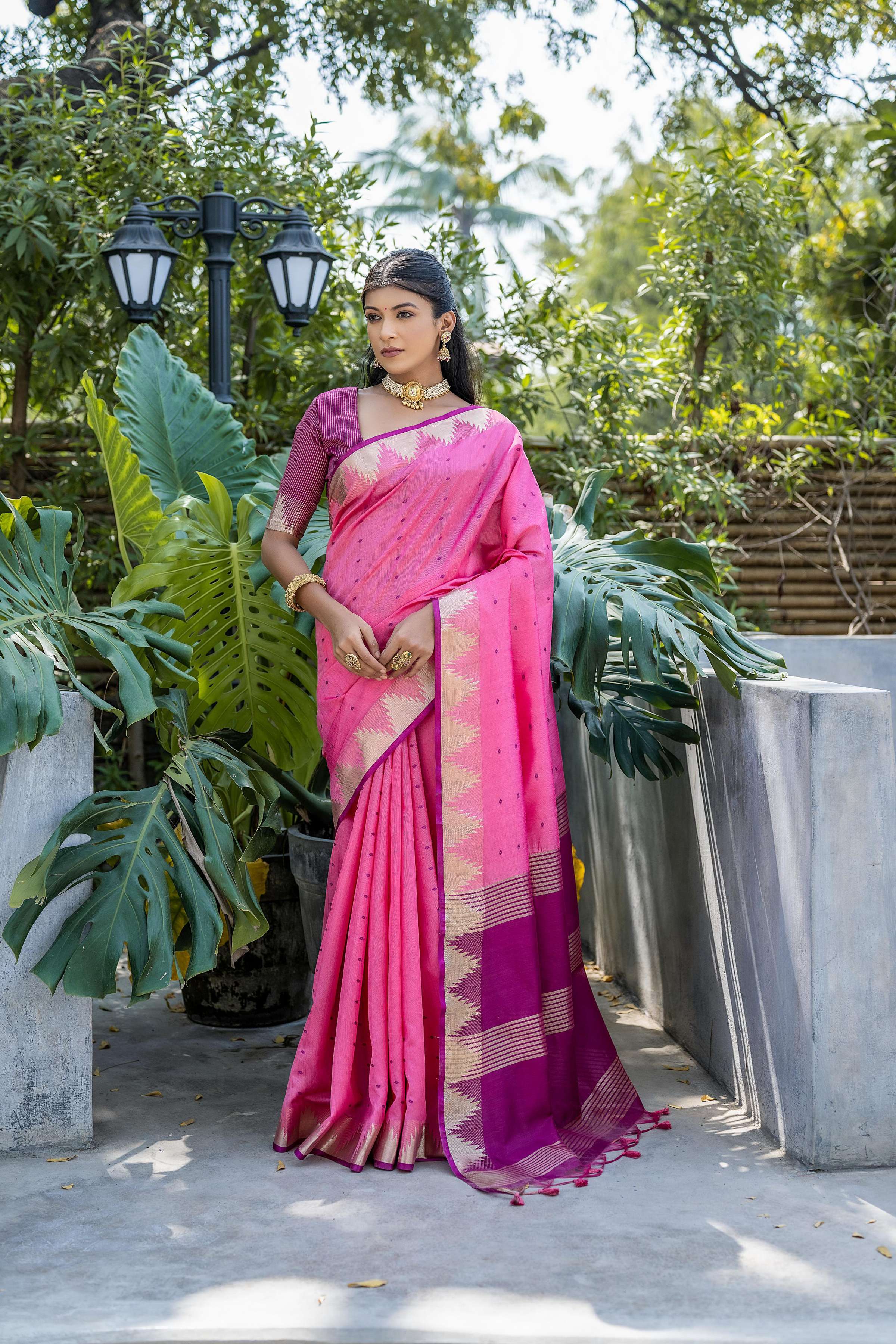 Pink semi tussar silk saree with traditional zari temple border and blouse