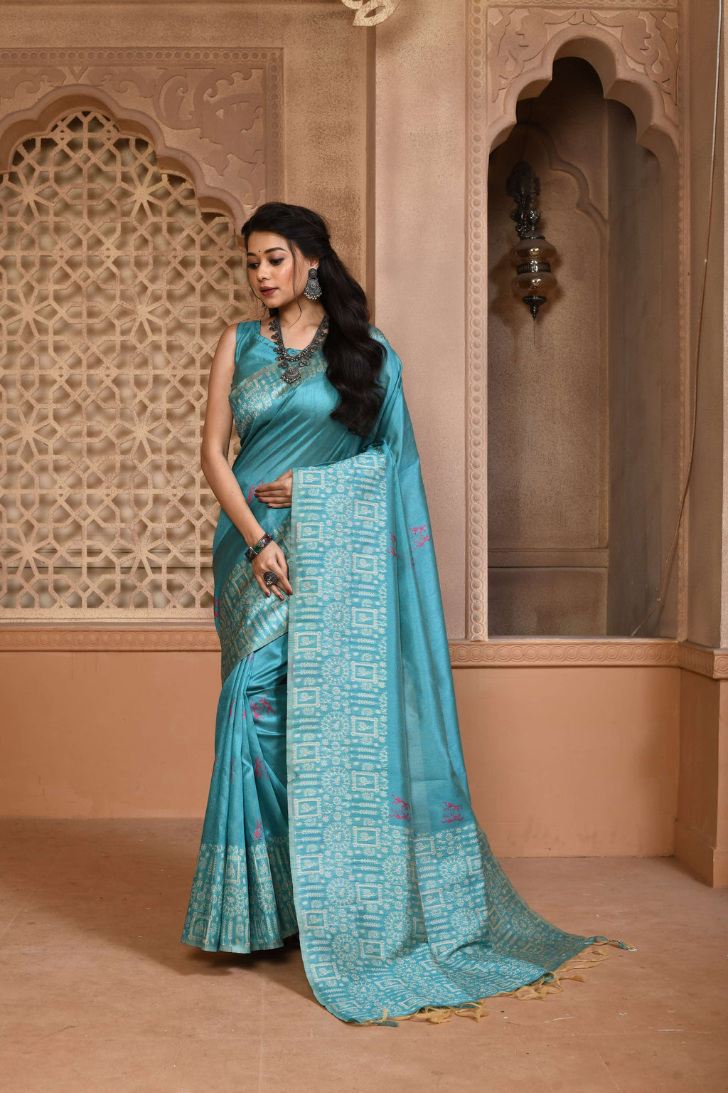 Firozi handloom raw silk saree with a heavily woven pallu
