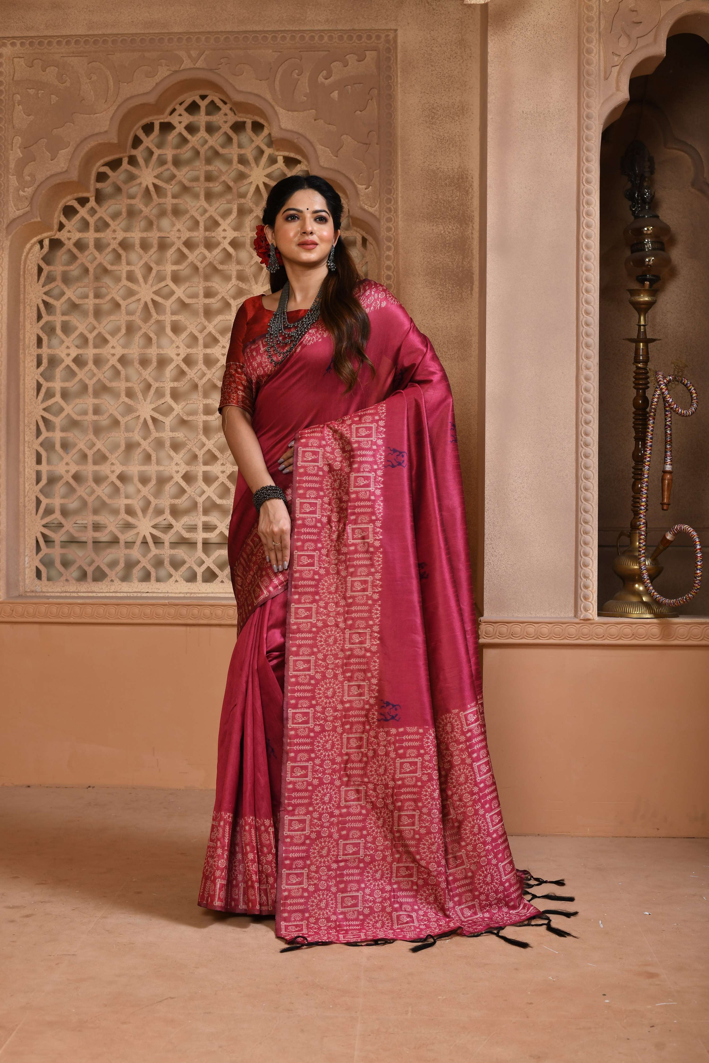 Rani pink handloom raw silk saree with detailed weaving pallu and matching blouse fabric