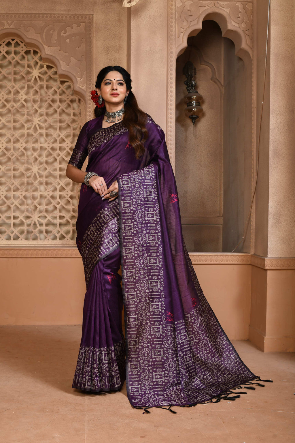 Purple handloom raw silk saree with an intricate traditional woven pallu