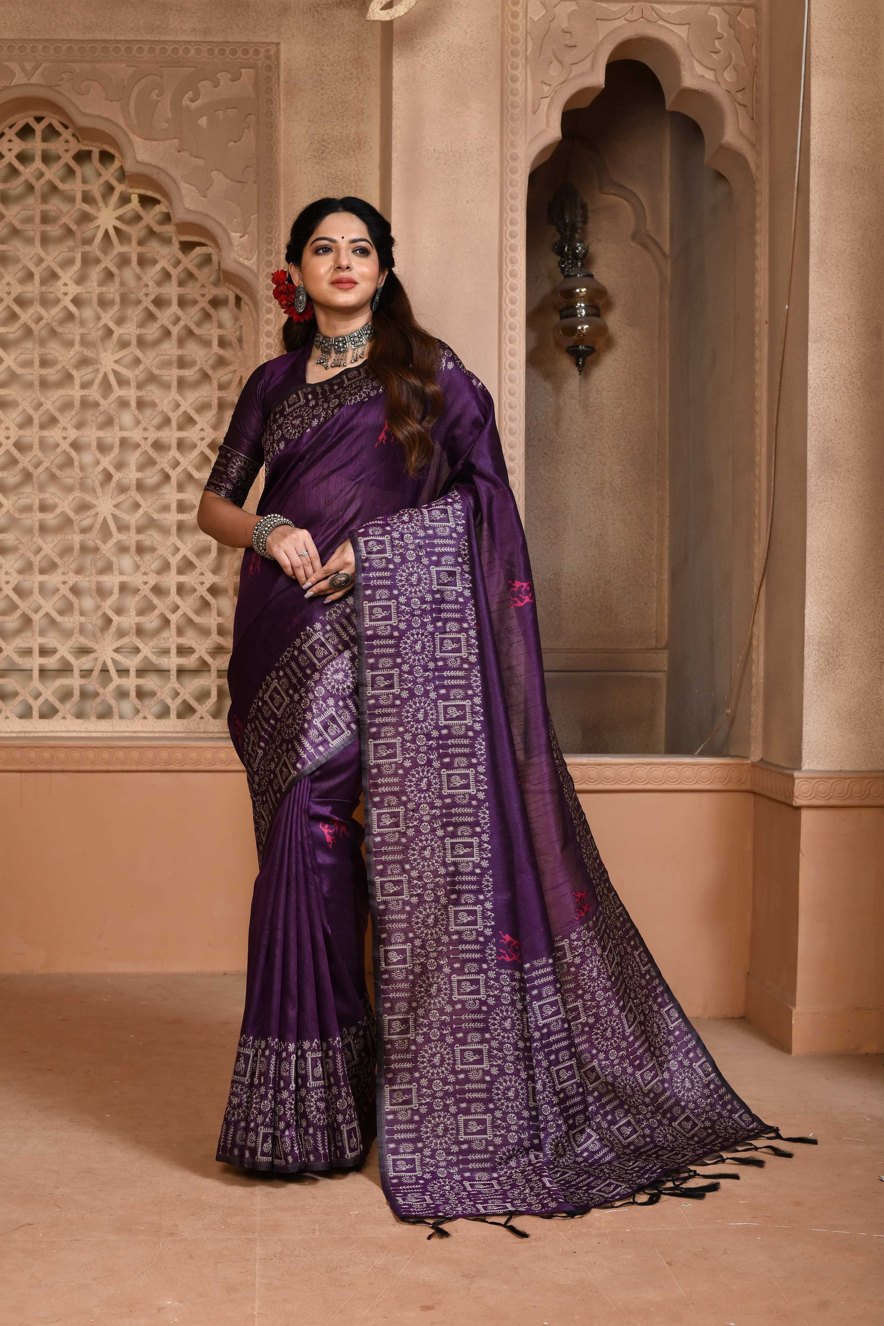Purple handloom raw silk saree with an intricate traditional woven pallu