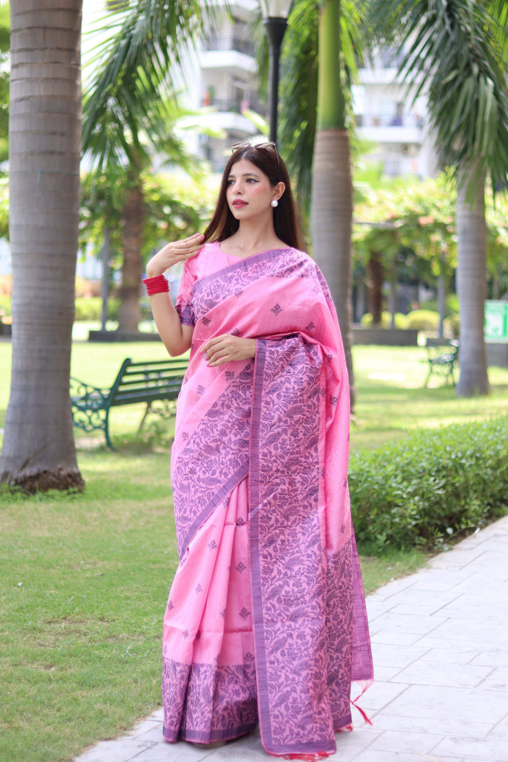 Baby pink handloom raw silk traditional saree with elegant weaving pallu and matching blouse piece