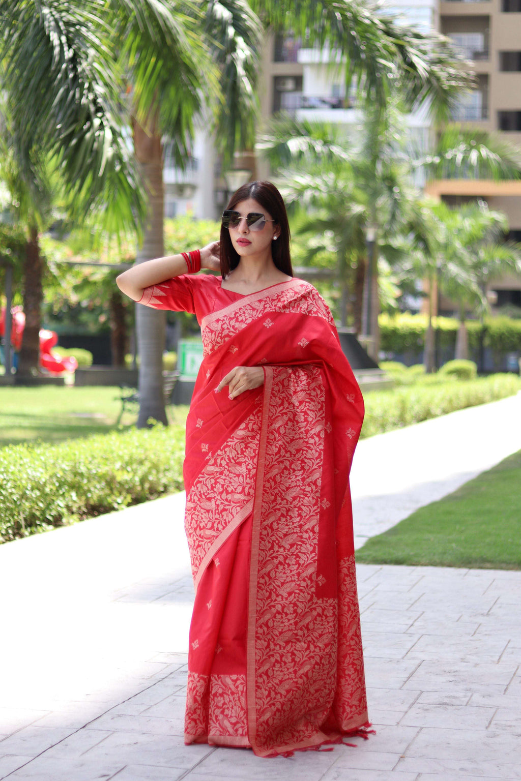 Red handloom raw silk saree with traditional weaving pallu detail