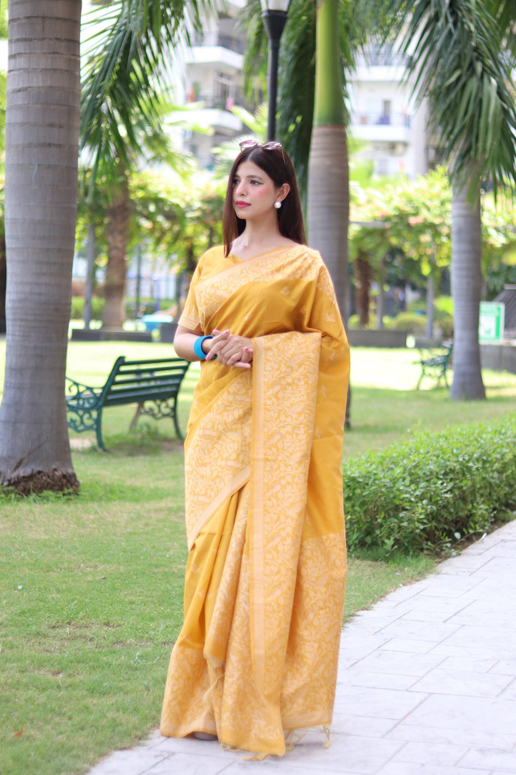 Yellow handloom raw silk saree with elegant woven pallu