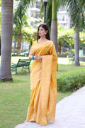 Yellow handloom raw silk saree with elegant woven pallu