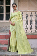 Beautiful light green handloom raw silk saree with a decorative traditional weaving pallu