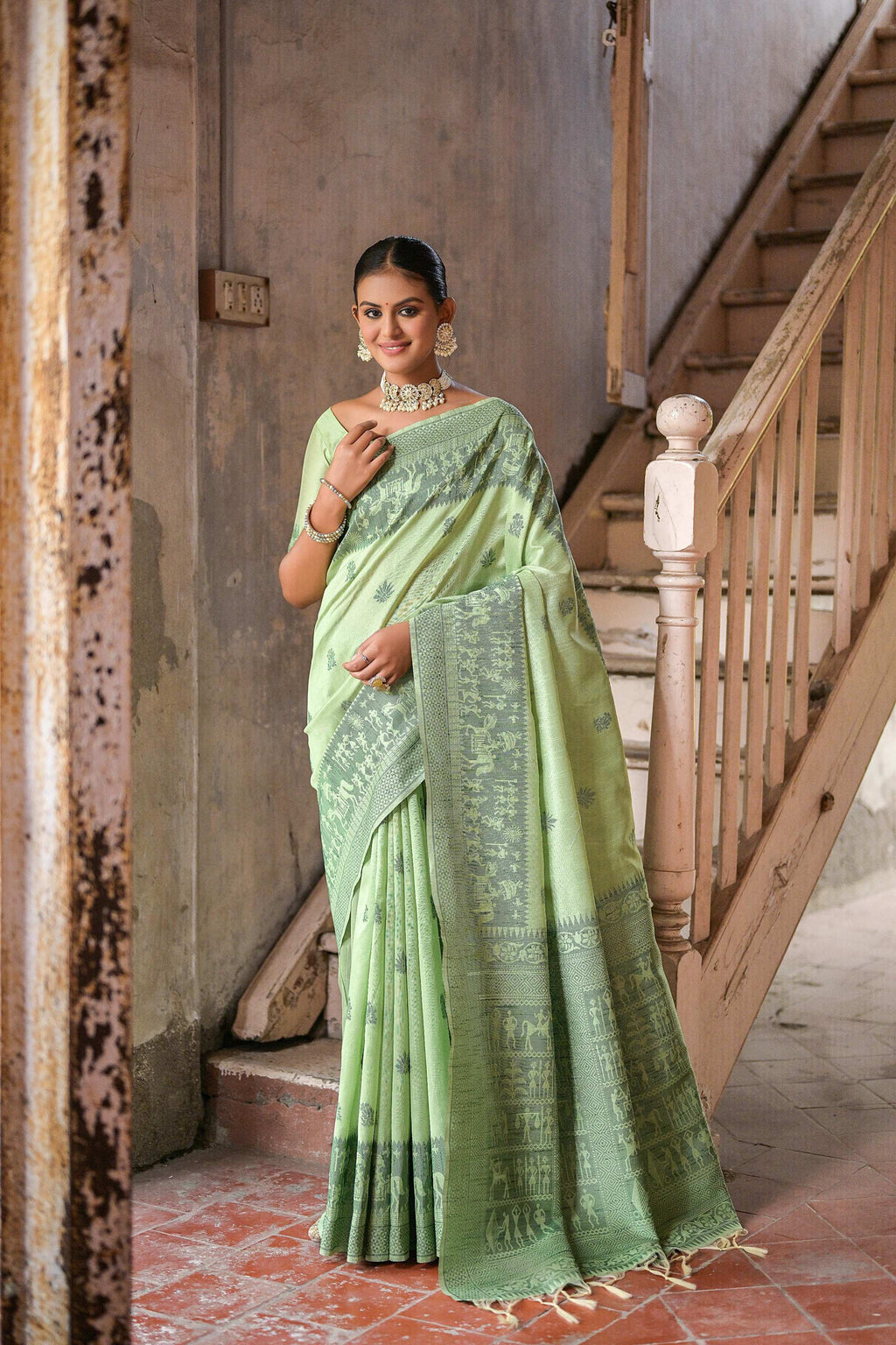 Pista green handloom raw silk saree with elegant weaving pallu and blouse fabric