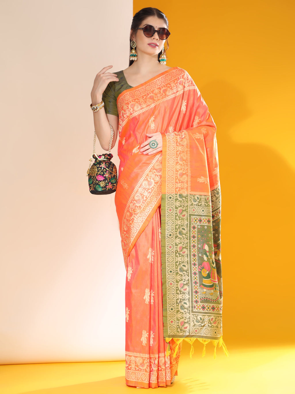Vibrant orange raw silk saree with two-tone weaving detail and matching blouse