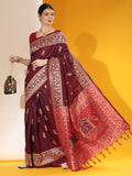 Wine two-tone raw silk saree with elegant weaving detail