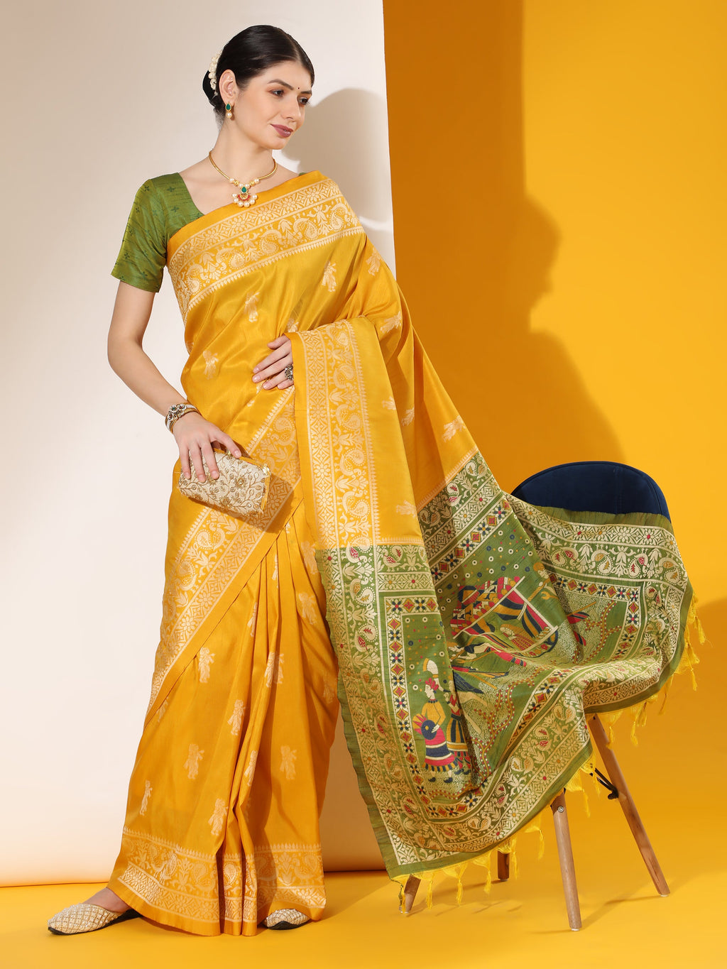 Vibrant yellow traditional two-tone raw silk saree with matching blouse fabric.