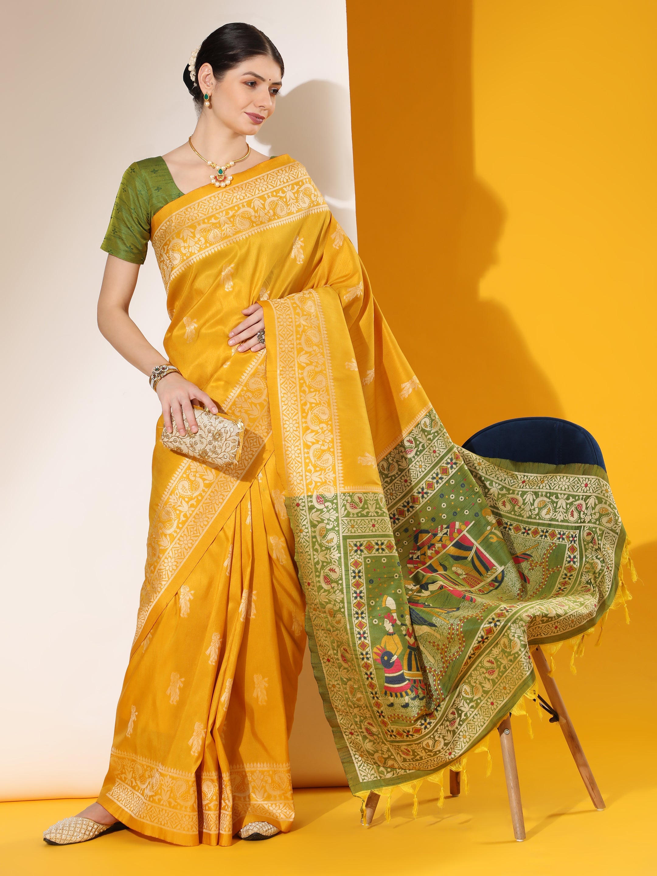 Vibrant yellow traditional two-tone raw silk saree with matching blouse fabric.