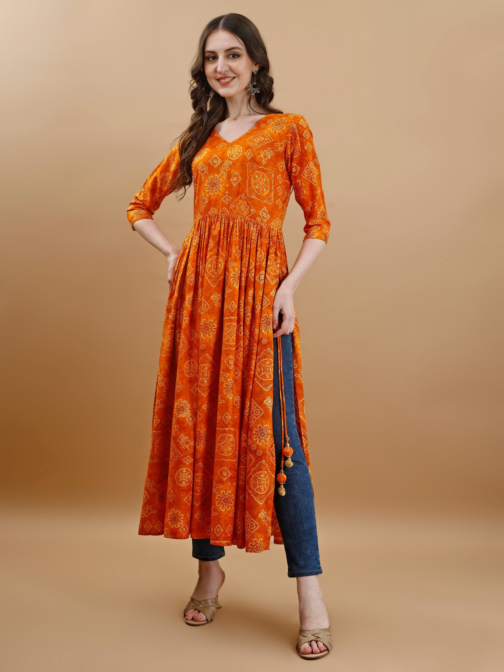 Mustard Rayon A-Line Bandhani Kurta with V-neck and handmade latkan details