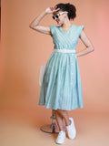 Sea green striped midi dress with embroidered belt and flared silhouette