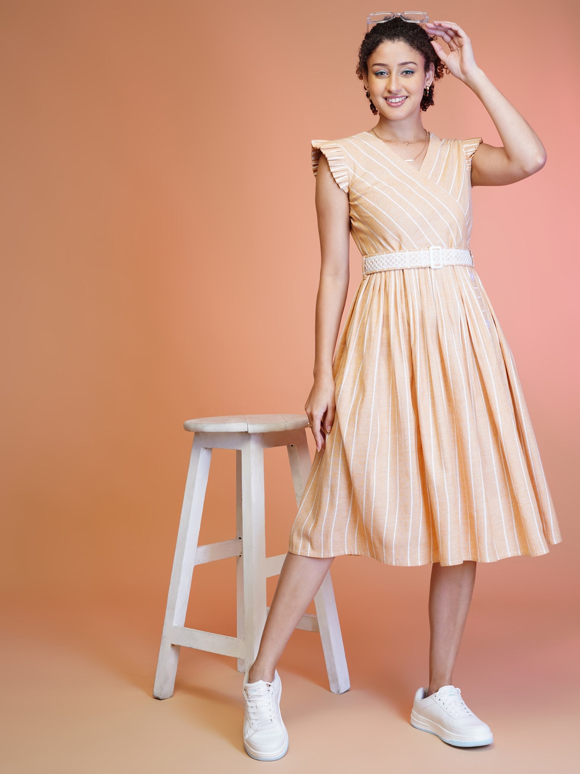 Orange and white striped cotton midi dress with an embroidered waist belt.