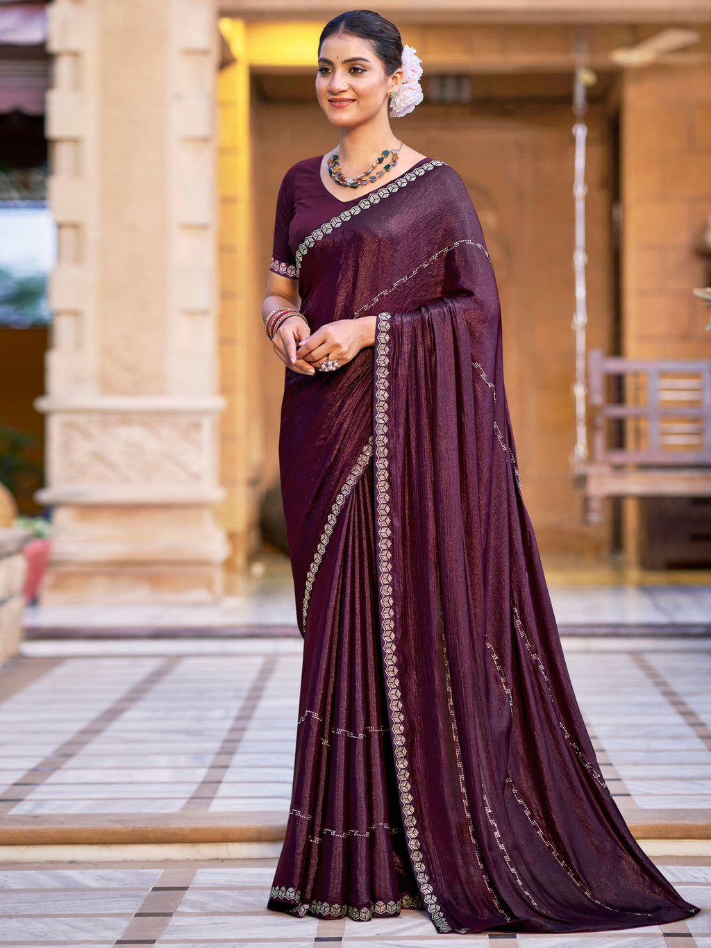 Wine shimmer chiffon saree with sparkling crystal line detailing