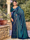 Teal shimmer chiffon saree with crystal lines on an embellished border