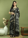 Black silk blend saree with floral prints and traditional gold Jari weaving