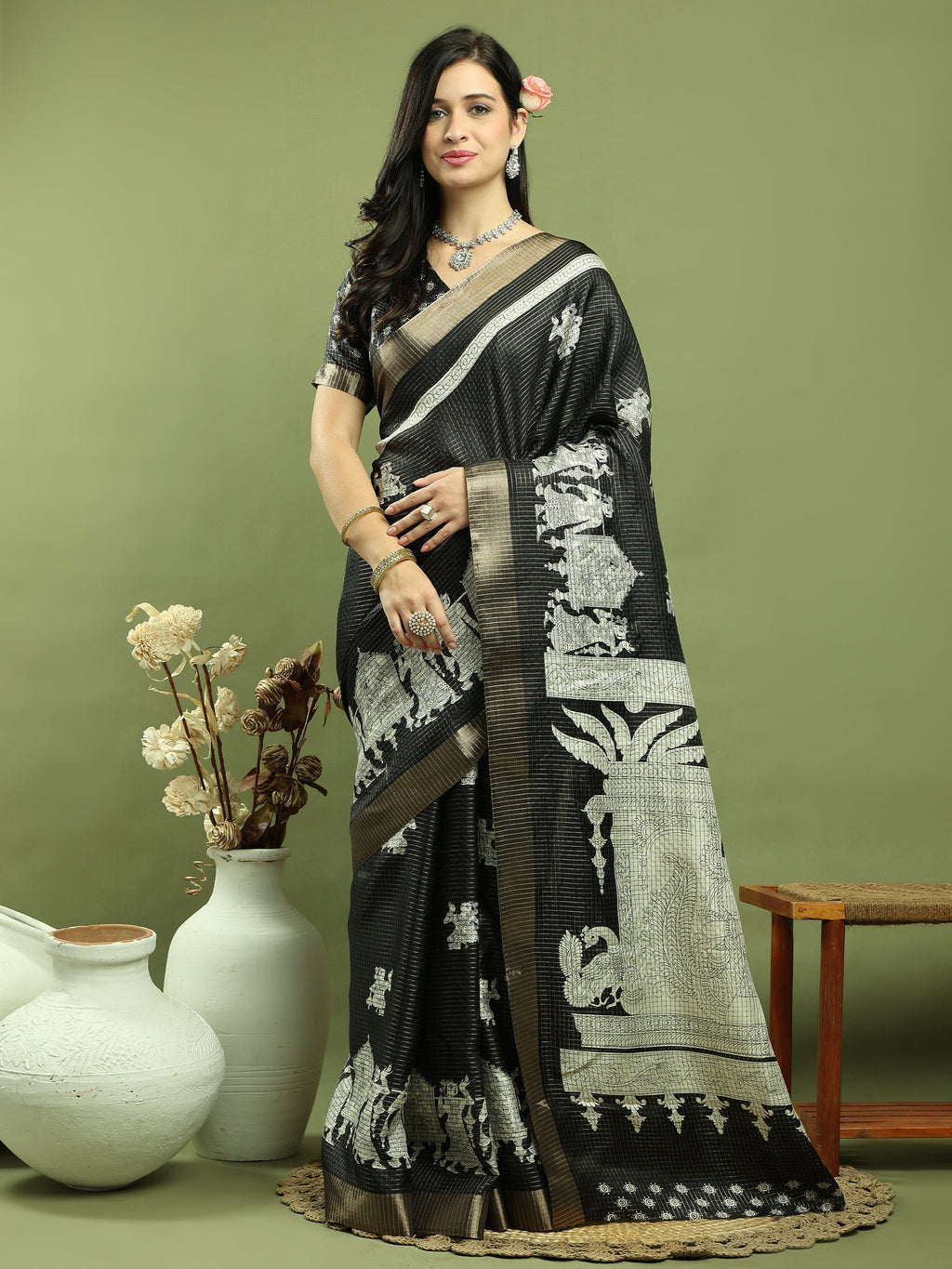 Black silk blend saree with detailed checks Jari weaving and devotional prints.