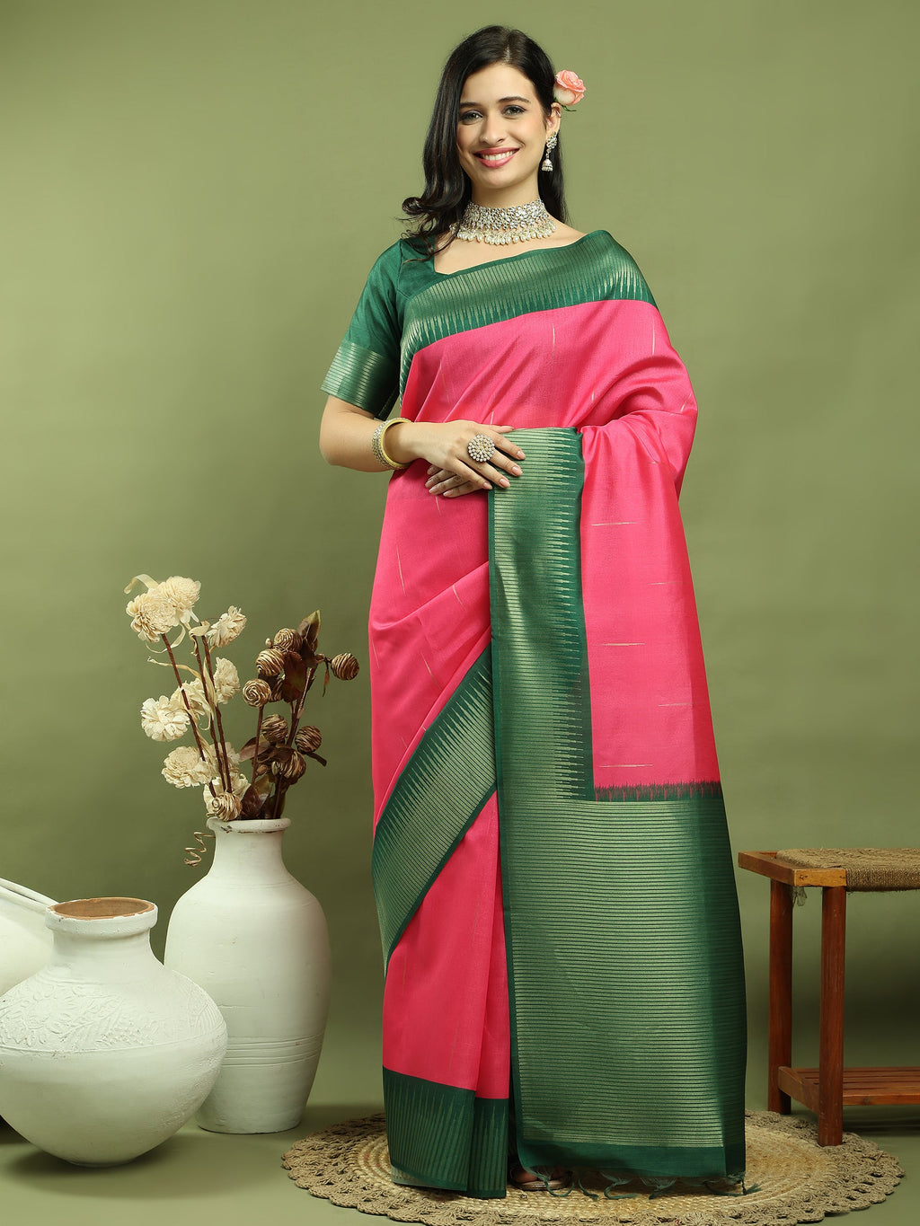 Pink silk blend saree with Ikat Jari weaving pattern and Jari border