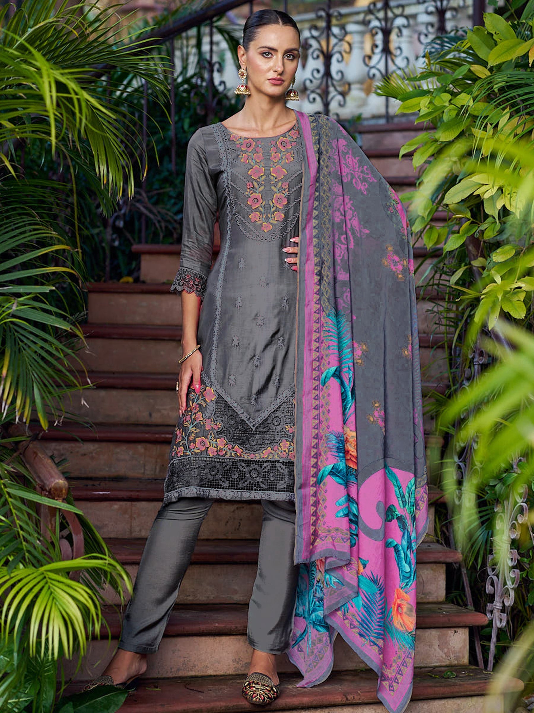 Grey muslin salwar suit featuring intricate Resham thread, Jari, and cut work.