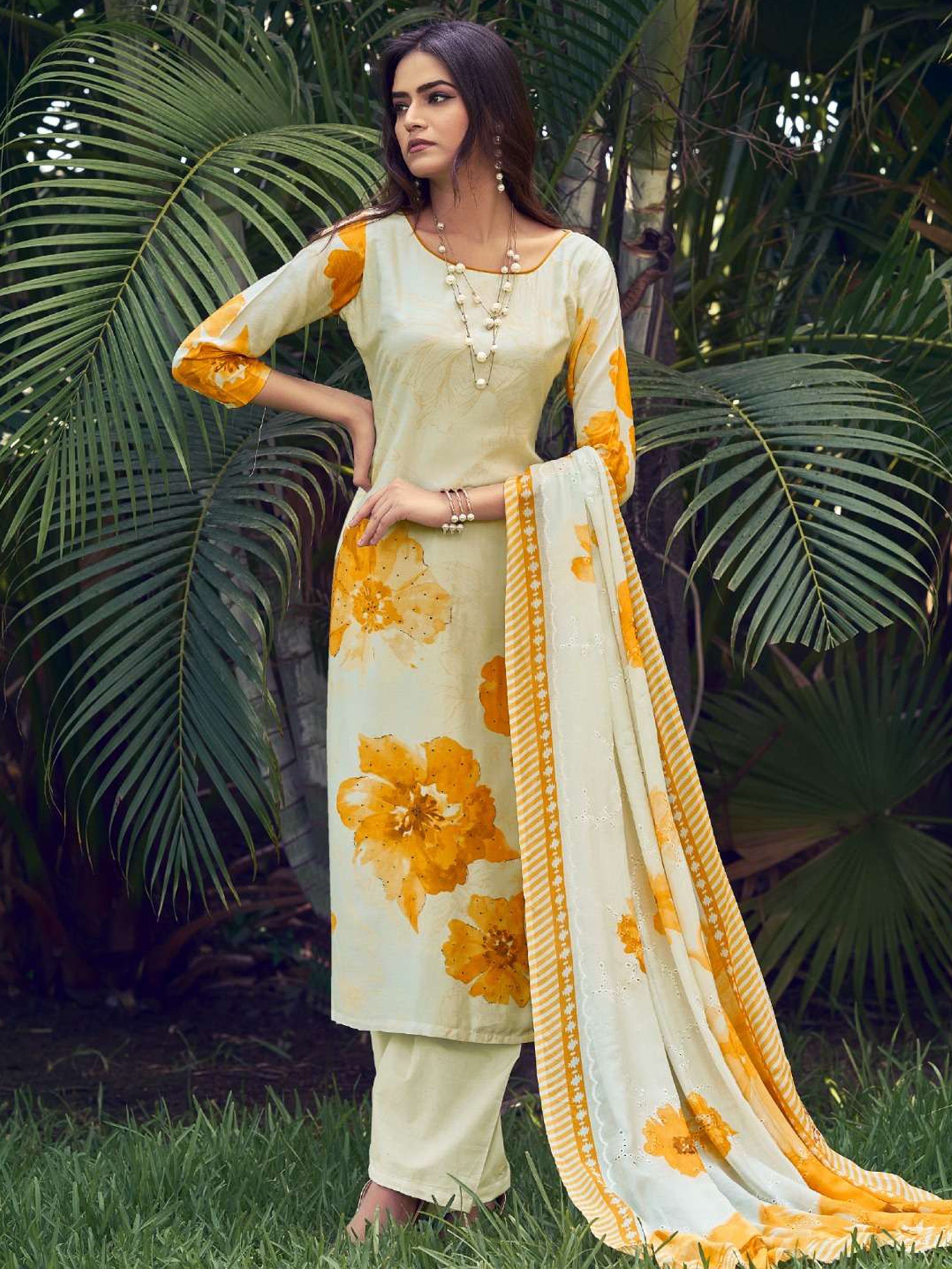Cream muslin salwar suit with floral digital print and intricate sequin detailing
