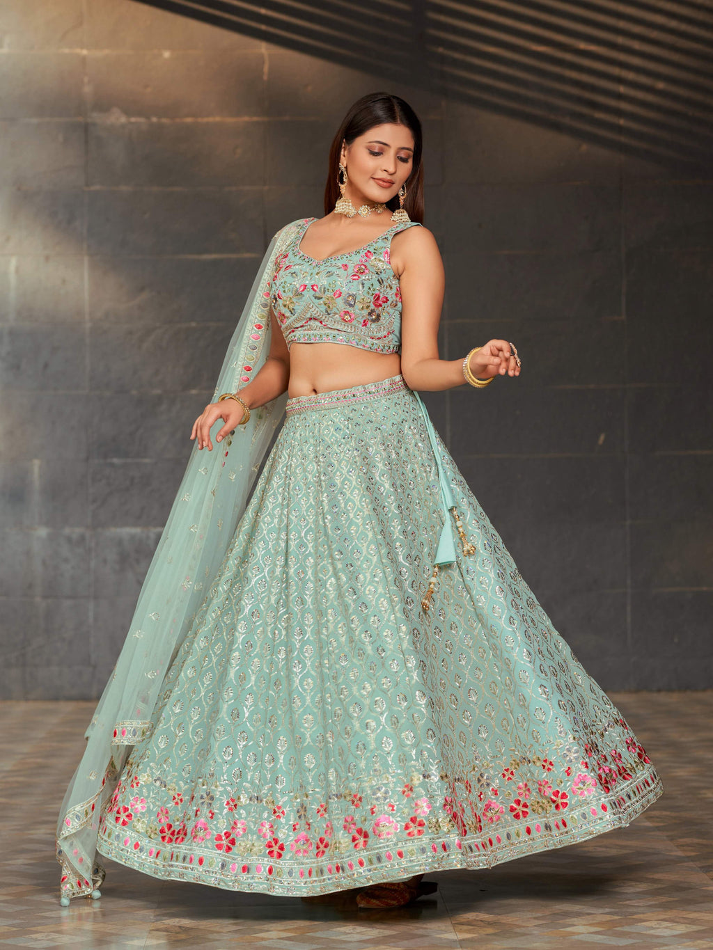 Sky Blue Georgette lehenga choli with mirror, zari, and sequin embroidery