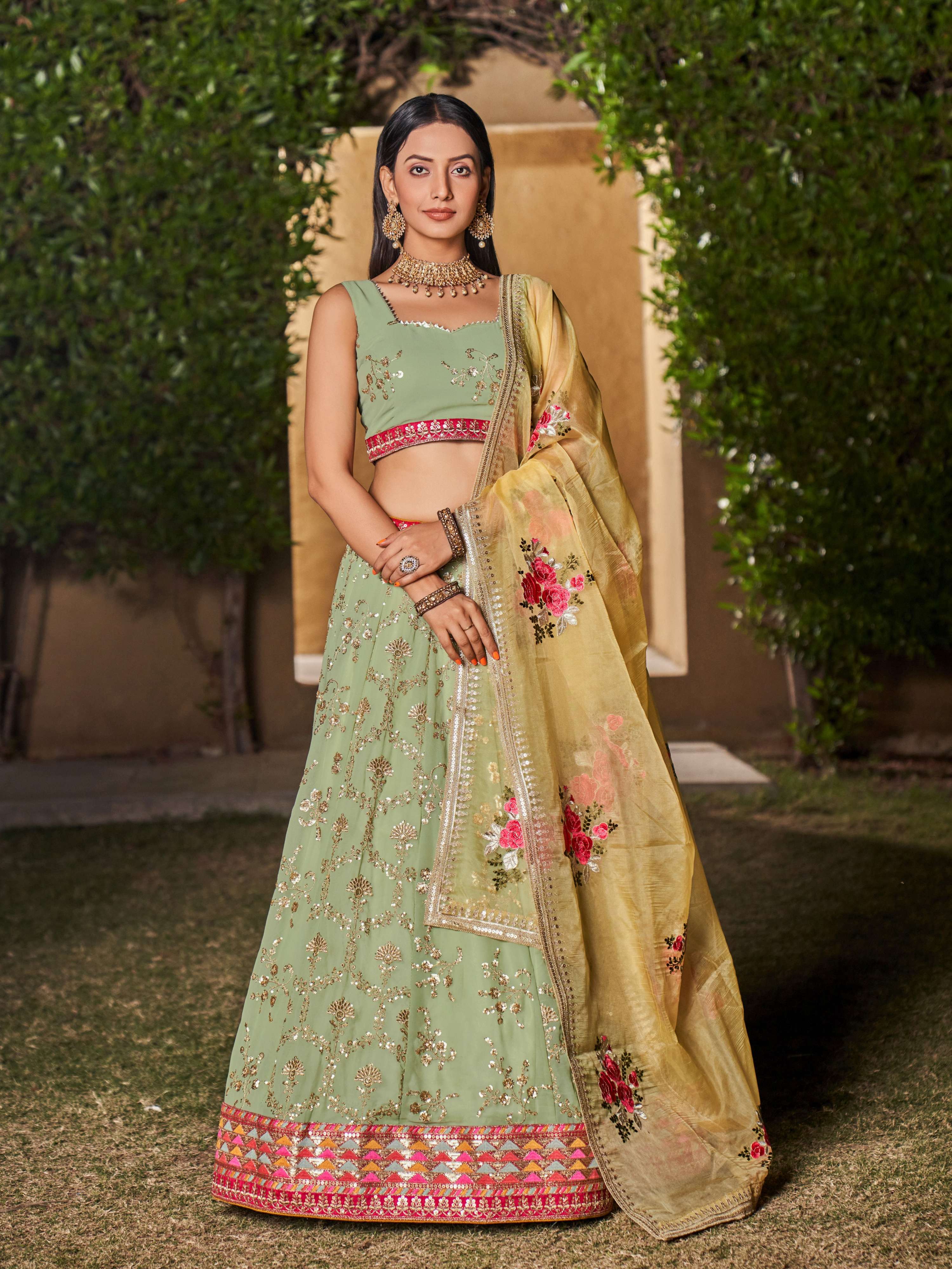 Pista green floral chiffon lehenga with gold and pink embroidery