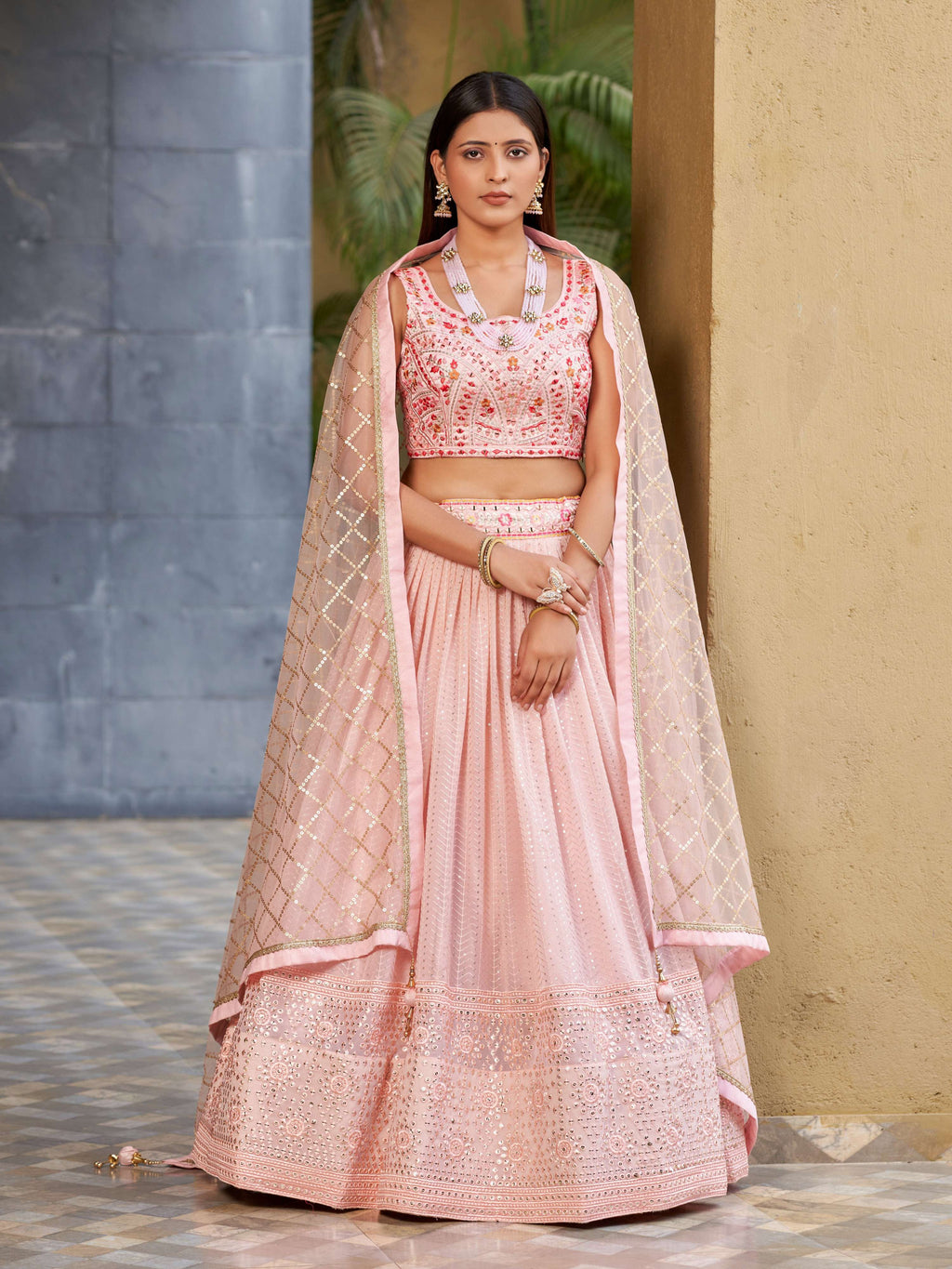 Pink georgette lehenga choli with heavy zari and real mirror work