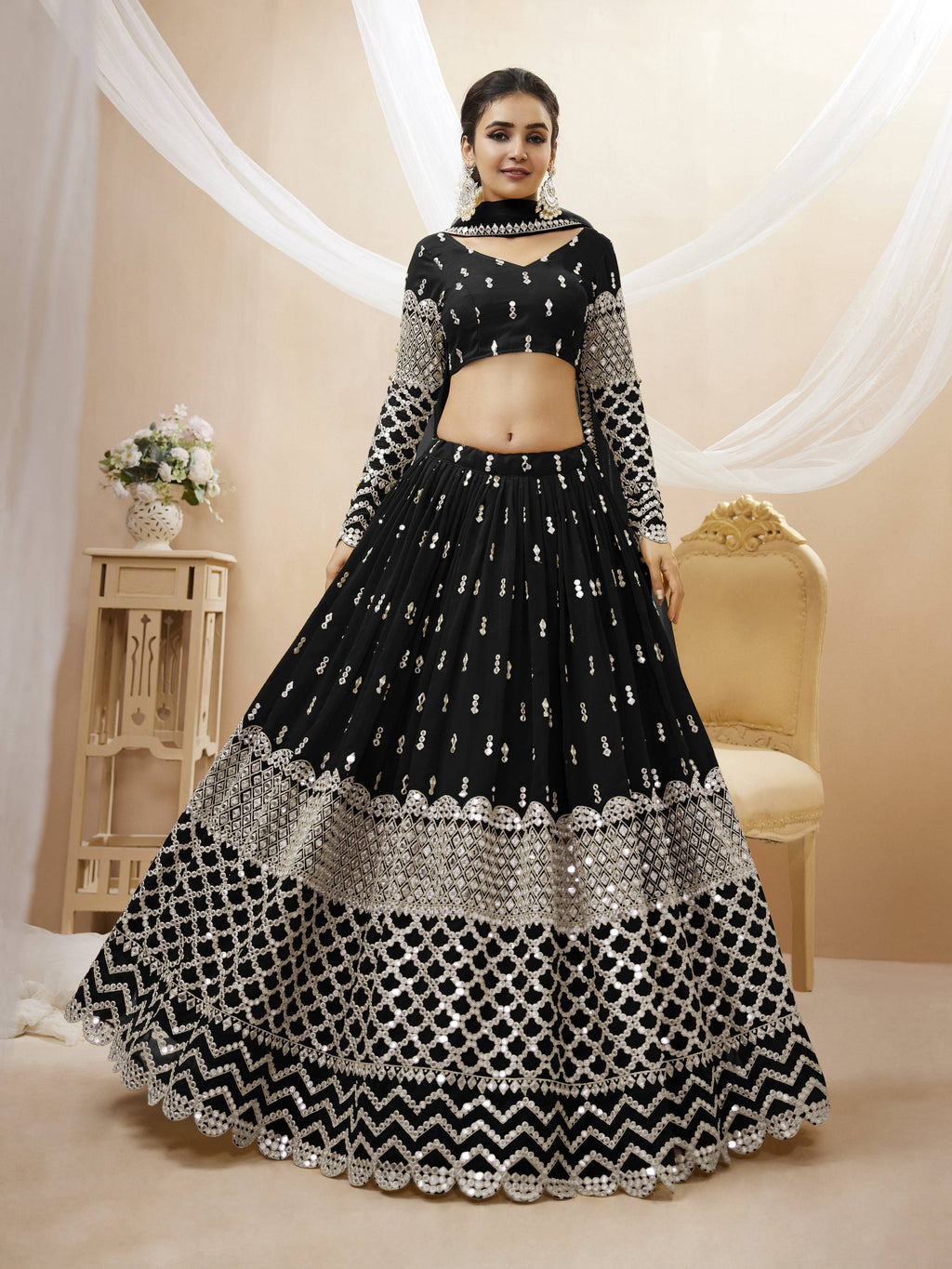 Stunning Black Georgette Lehenga Choli featuring detailed sequins and Zari embroidery.
