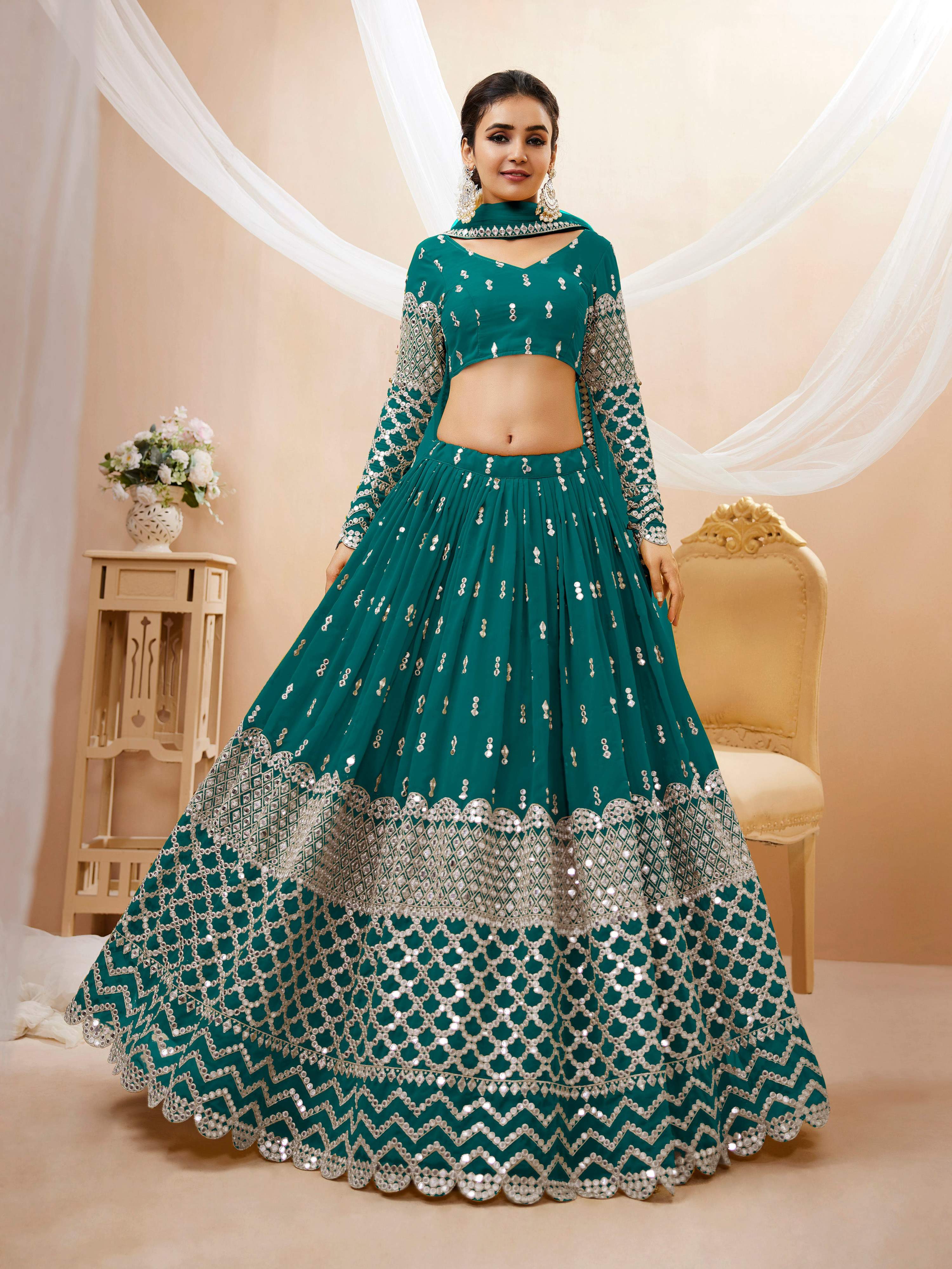 Teal Blue Georgette lehenga choli with heavy sequins and zari embroidery for weddings