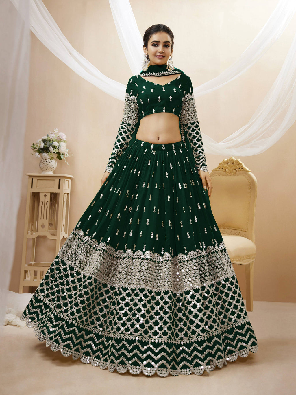 Green georgette lehenga choli with intricate sequins and zari embroidery