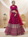 Model wearing a vibrant Hot Pink Georgette lehenga with zari and sequins embroidery