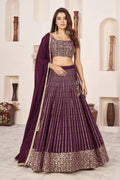 Wine colored Georgette lehenga choli featuring elegant sequins and zari work